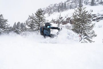 Mountain Slayerz snowmobile guide leading tour above Park City