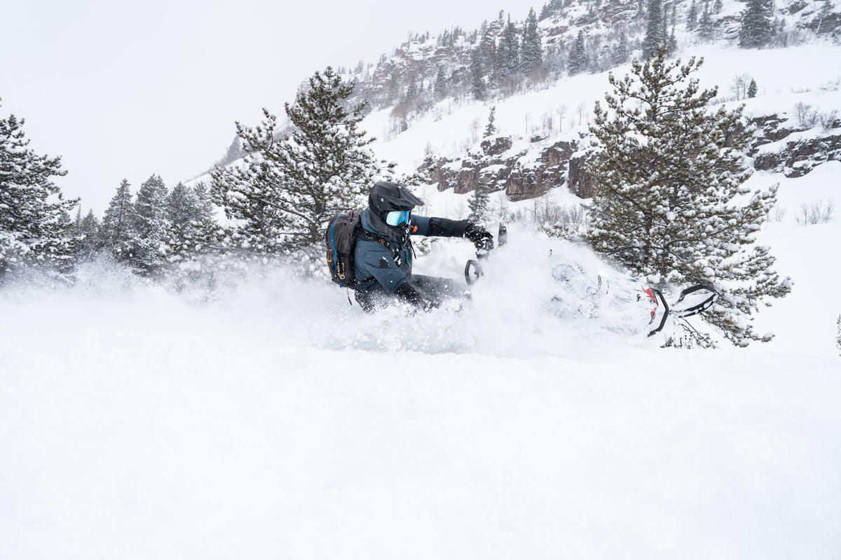 Mountain Slayerz snowmobile guide leading tour above Park City