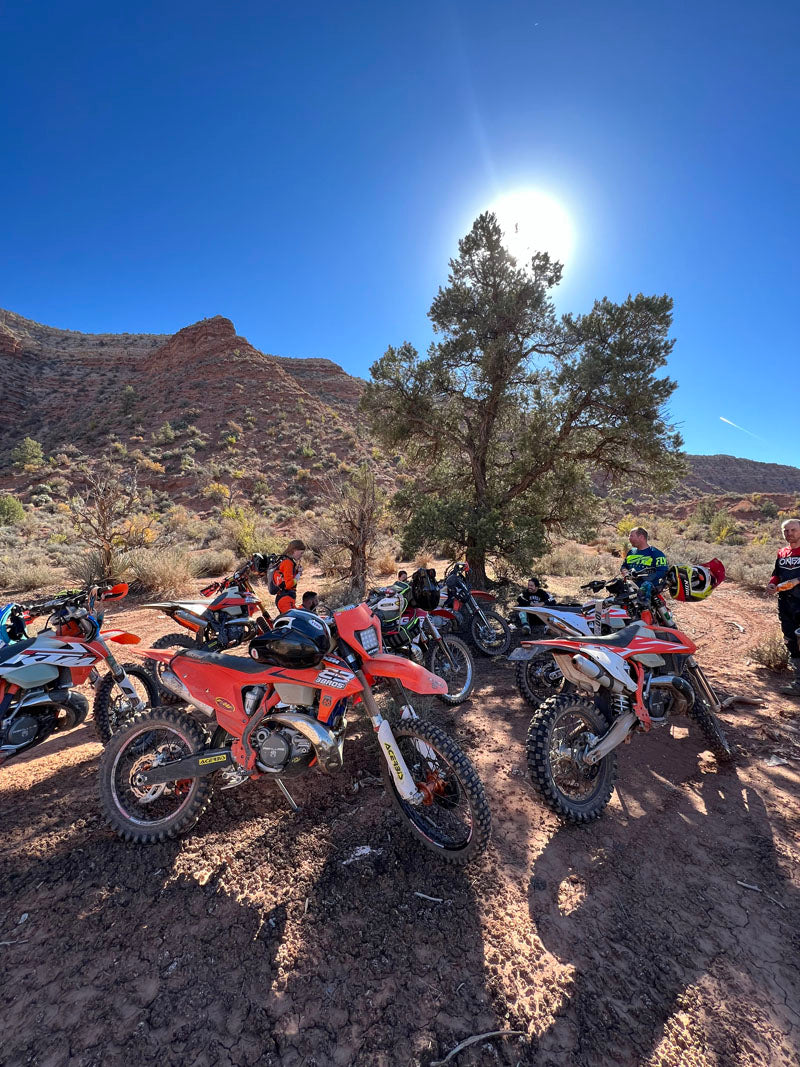 Dirt biker on scenic red rock terrain near St. George, Utah
