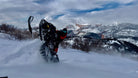 Ski-Doo snowmobile on backcountry trail in Park City, Utah mountains
