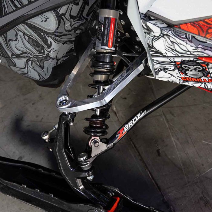 Zbroz 34-inch chromoly A-arm kit lifestyle — raw finish Ski-Doo