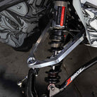 Zbroz billet upper A-arm kit on Ski-Doo sled — raw finish lifestyle
