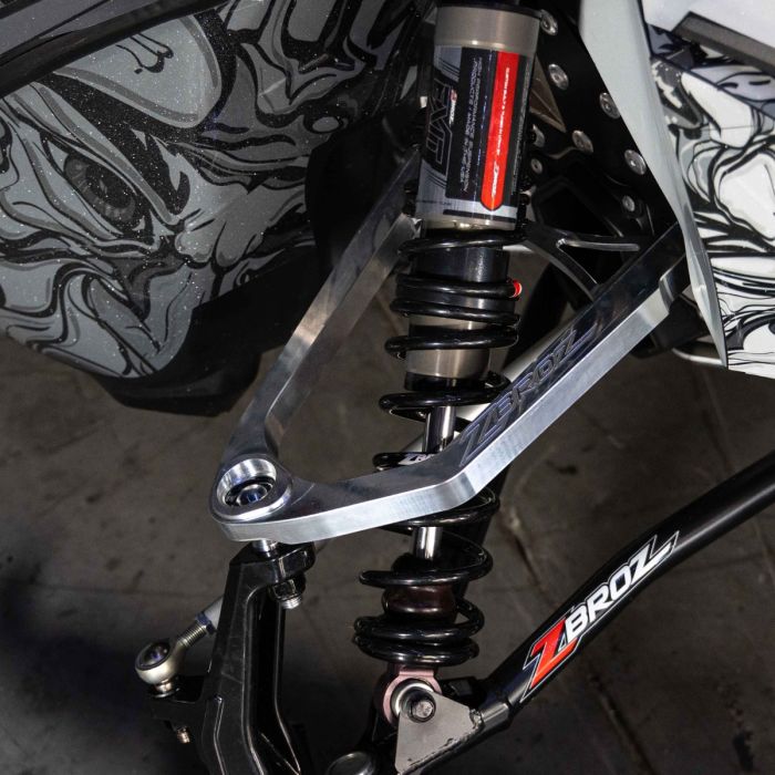 Zbroz billet upper A-arm kit on Ski-Doo sled — raw finish lifestyle
