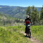 Electric dirt bike tour Utah — rider on scenic mountain trail